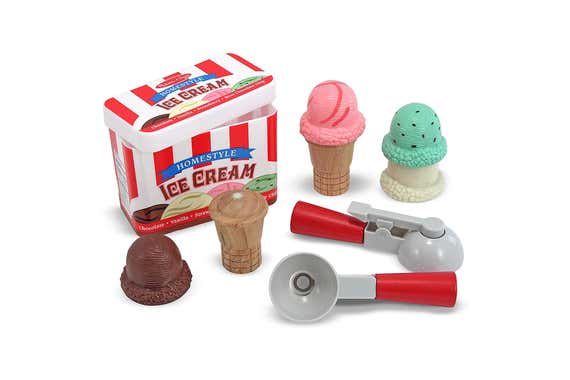 The Melissa & Doug Scoop & Stack Ice Cream Cone Play Set, shown with it's box, two toy scoopers, and two cones of ice cream.